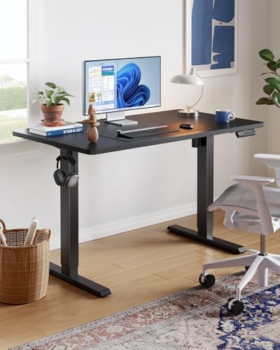 HUANUO 55x27 Inch Electric Standing Desk, Height Adjustable, Black - Image 2