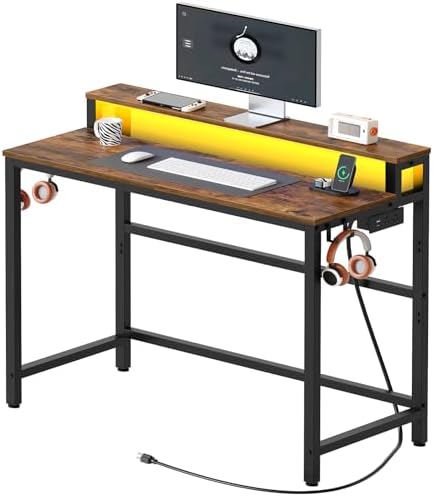 YATINEY Small Computer Desk with Charging Station and LED Lights, Gaming Desk with Monitor Stand, 2-Tier Home Office Desk with 4 Side Hooks, for Living Room, Home Office, Rustic Brown DN01UDBRY2 by Yatiney