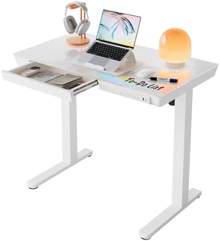 HUANUO Glass Standing Desk with Drawers, 35 X 20 Inch Electric Adjustable Height Desk, Quick Install One-Piece Tabletop with USB Charging Ports, White by HUANUO